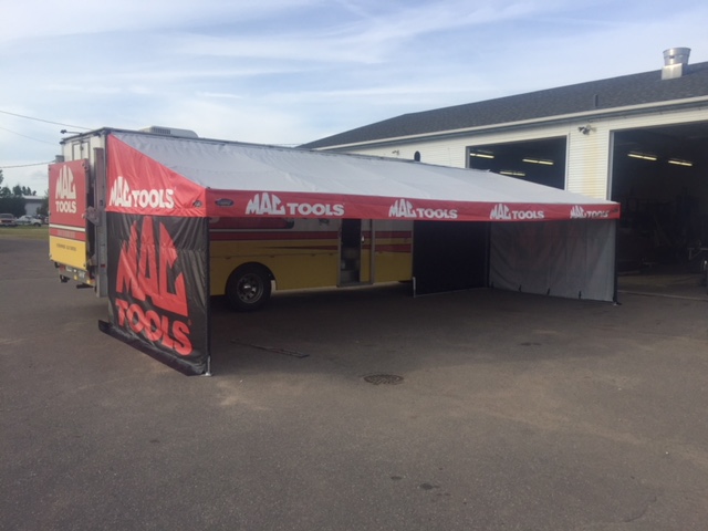 Hospitality trailer awning built by DMP Awnings for sponsor and VIP hosting